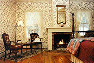 John's Room at Bailey's Mills includes a fireplace and old fashioned tub